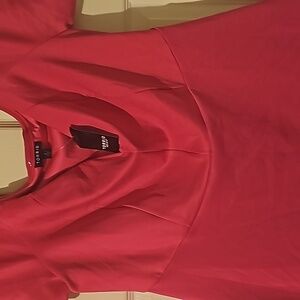 Torrid top in a beautiful fushia pink color...small v cut in the front area.